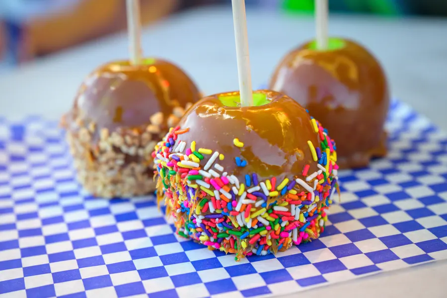 Caramel apples with sprinkles and nuts
